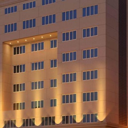 Asiana Hotel Dubai Exterior foto The building of the university library