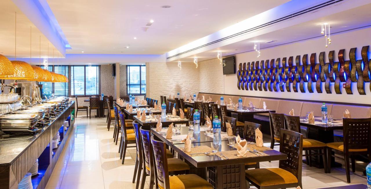 Asiana Hotel Dubai Exterior foto The restaurant