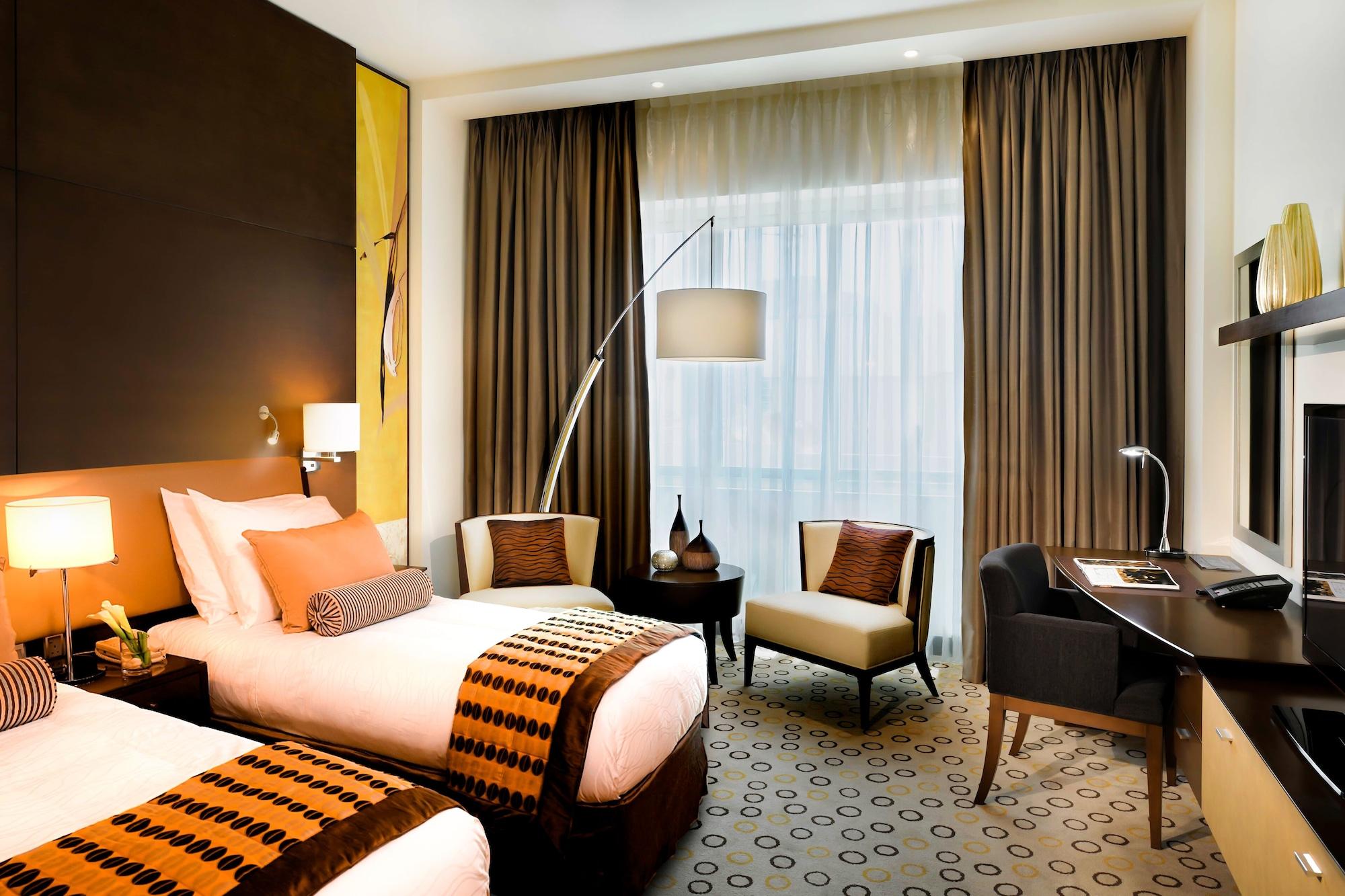 Asiana Hotel Dubai Exterior foto A room at the hotel