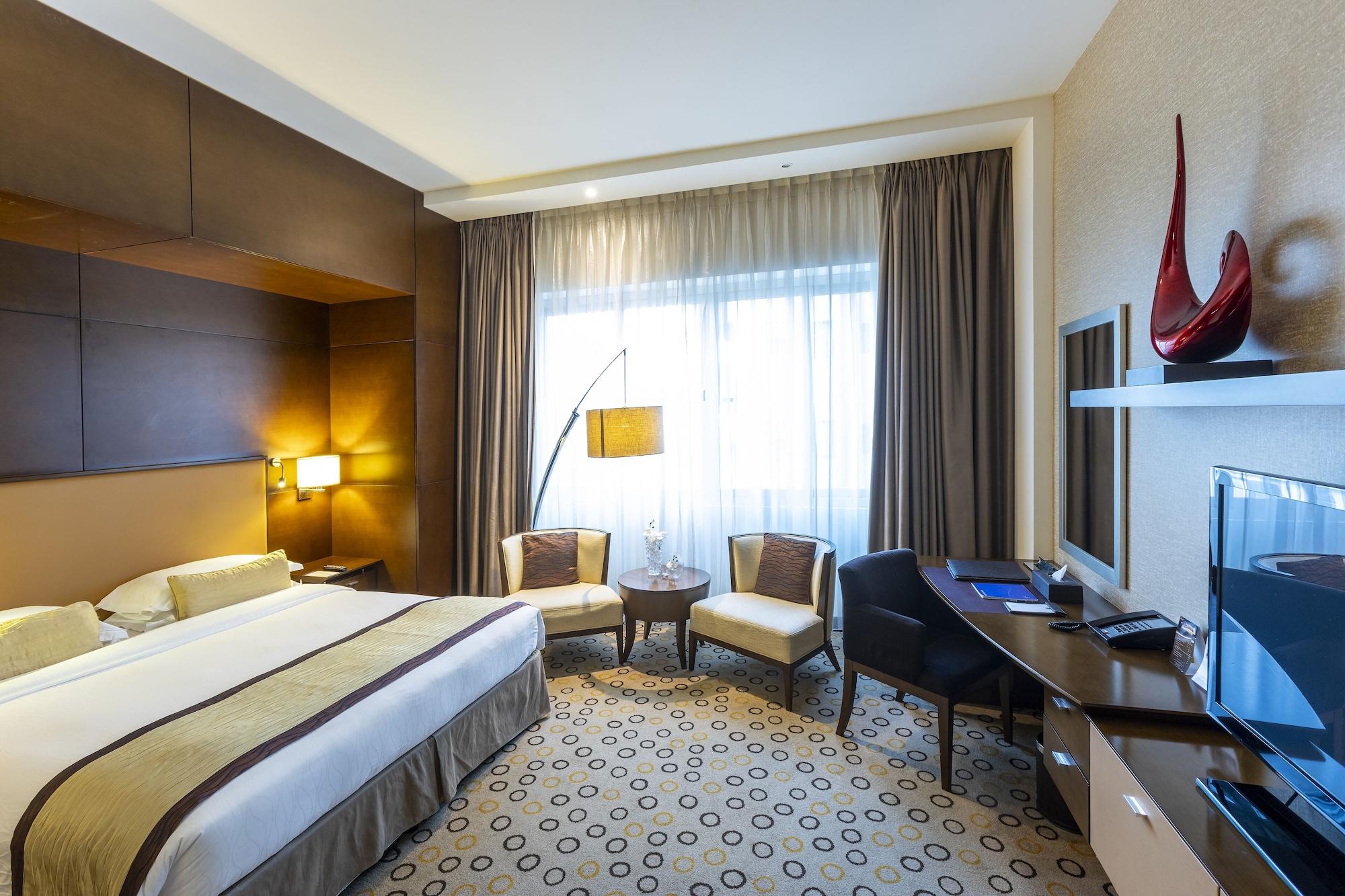 Asiana Hotel Dubai Exterior foto A room at the hotel