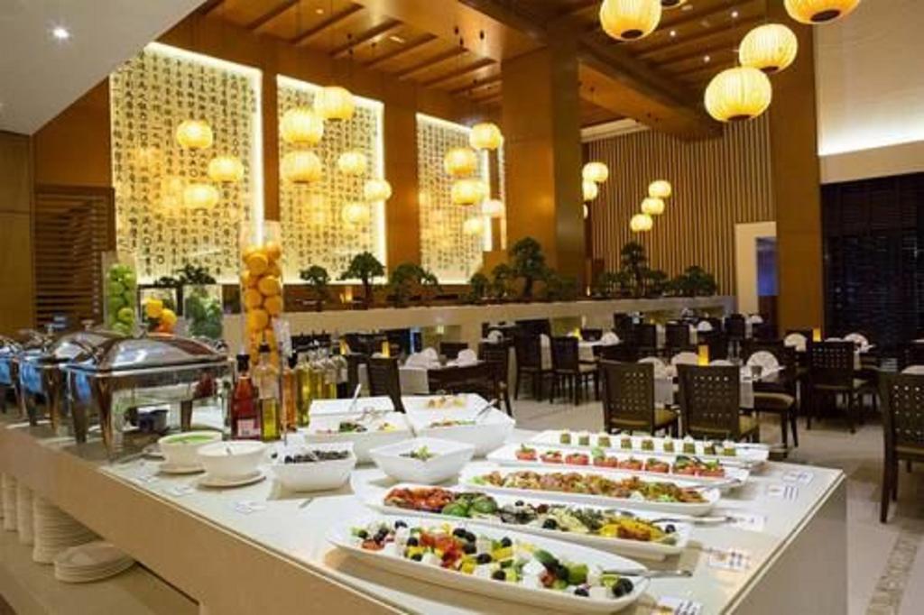 Asiana Hotel Dubai Exterior foto The restaurant at the hotel